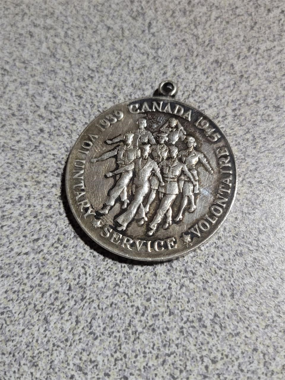 silver coin pendent
