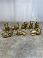 Assortment of gold painted cats
