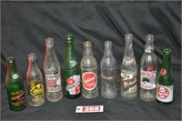 Vintage soda bottles from Vincennes, Evansville