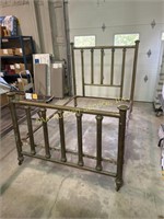 Brass bed frame. Holds a 77 inch X 53