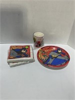 lot of assorted paper plates, napkins, cups,