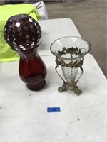 red vase, gold vase on stand