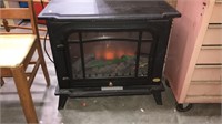 Fireplace heater with blower and two heat