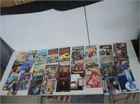 COMIC BOOKS-INDIANA JONES,TARZAN,100 BULLETS,ETC.