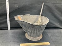 Antique coal bucket with shovel