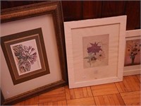 Three framed pieces, all with flowers