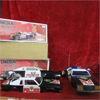 (2)Toy police cars w/boxes.