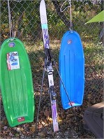 Pair of vintage snow skis and poles