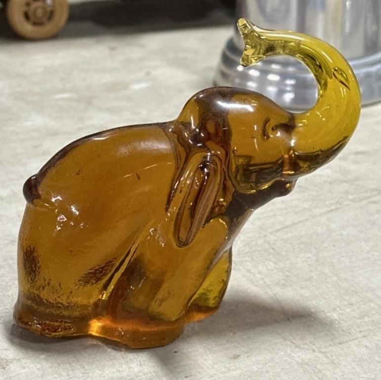 Amber colored glass elephant