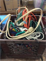 Crate of extension cords and other garage items