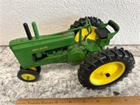 Metal John Deere A toy tractor. Ertl?