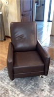 2 mid century modern swival brown chairs. No