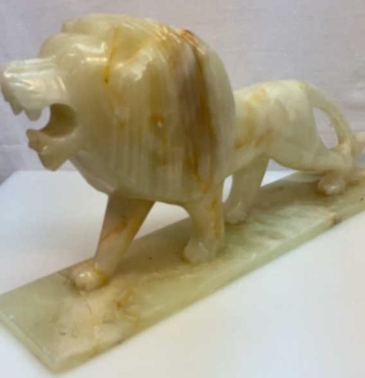 Carved solid onyx lion