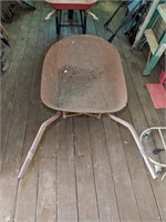 Wheelbarrow (rusty & has some small holes)