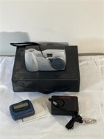 Kodak 35 mm camera, pager, sports radio
