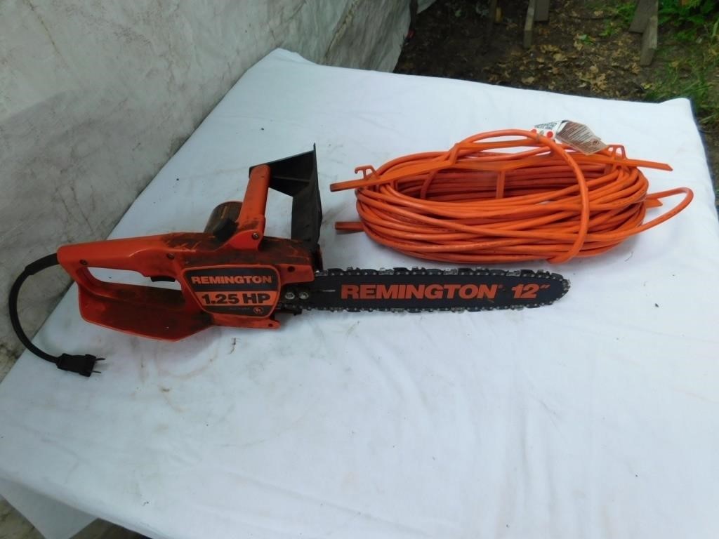 Remington 1.25HP, 12" electric chain saw, works.