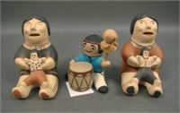 Three Pueblo Pottery Story Teller Figures. Signed