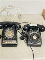 pair of black rotary phones