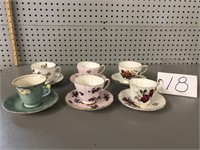 TEA CUPS AND SAUCERS