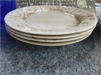 Four matching plates by Sylvan, semi-porcelain