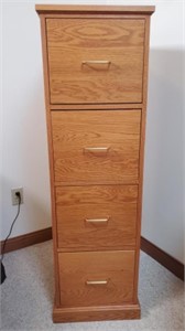 Four drawer file cabinet.
