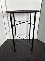 Black metal framed plant stand