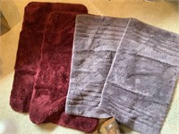 2 sets of bathroom rugs