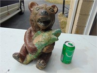concrete bear with fish