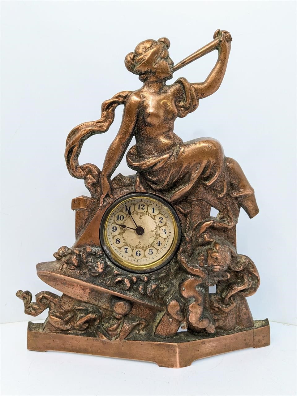 Metal Cherub and Herald Mantel Clock