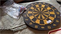 Dart board with bag of darts