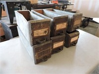 6 wood faced metal drawers