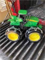 John Deere toy tractor with light up wheels
