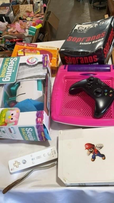 Wii, not tested no cords, sewing machine, games