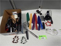 Kitchen utensils, cookie cutters, and kitchen kniv