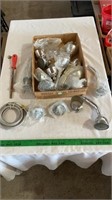Assorted shower heads, faucet hose, hand file