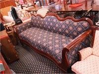 Mahogany Empire-style sofa with carved back,