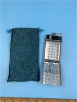 Lighter and cigarette case in one unit with cloth