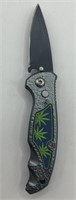 (V) 2" Marijuana Push Button Switchblade