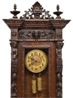 ITALIAN FIGURAL CARVED WEIGHT DRIVEN WALL CLOCK