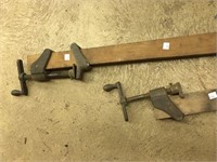 2 old wooden clamp