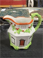 Staffordshire house pitcher.
