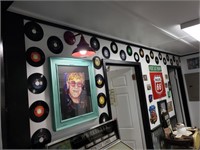 45's records deal (on wall) (30 records)