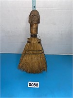 Antique carved dog head whisk broom missing one