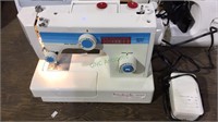 White brand sewing machine with stitch selector,