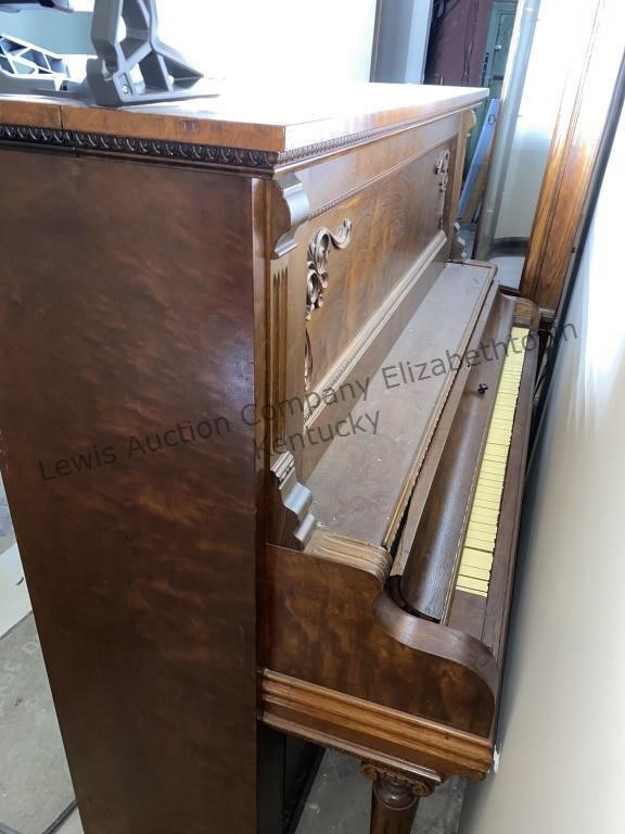 Vintage upright piano, it's located main floor no