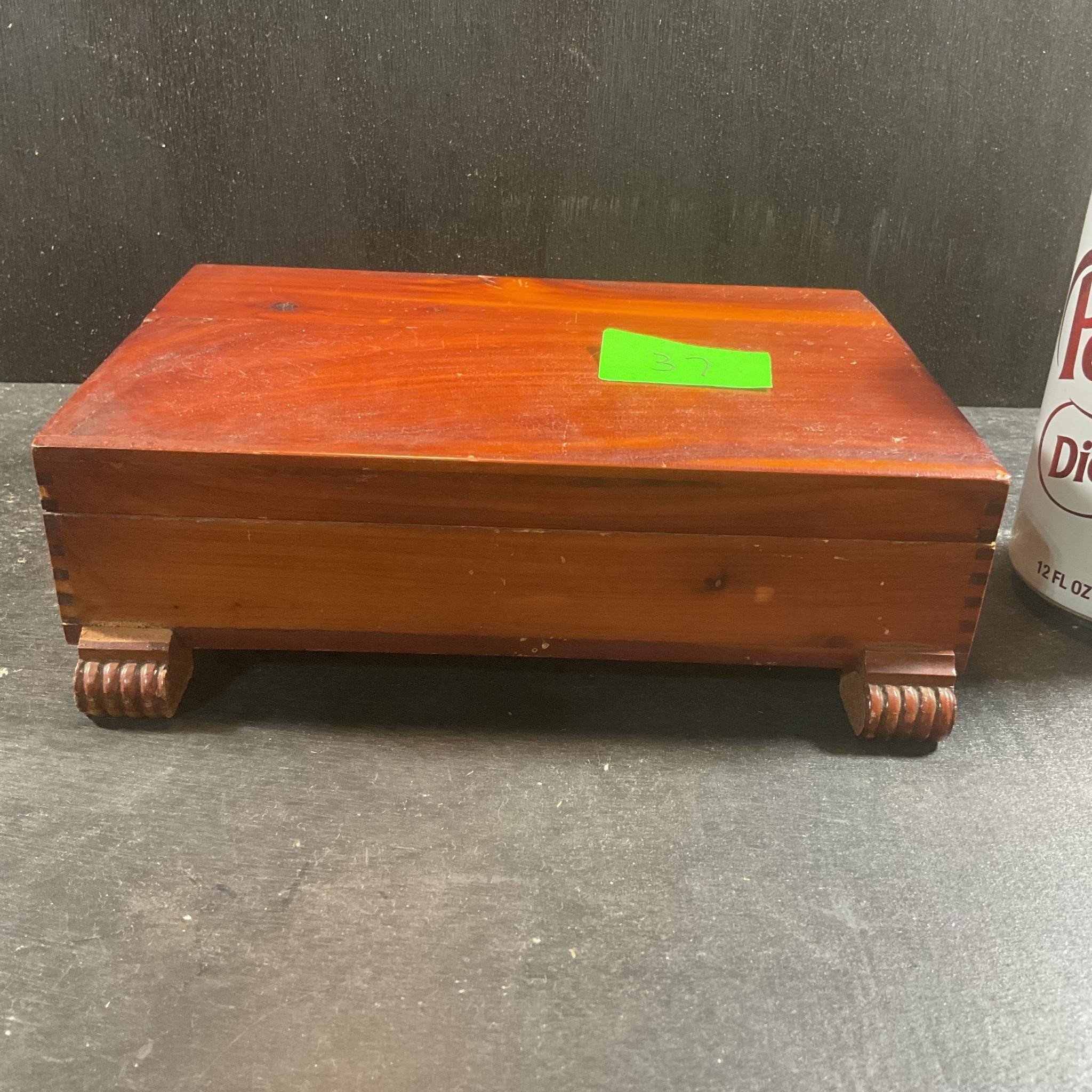 Cedar box with carved feet dovetailed