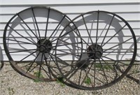 (2) Steel wheels. Measures: 38" Diameter.
