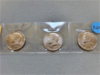 Kennedy half dollars; all are 1776-1976.  Buyer mu