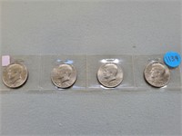 4 Kennedy half dollars; all are 1776-1976.  Buyer