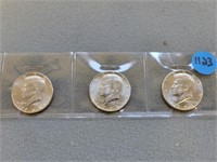 3 Kennedy half dollars; all are 1964.  Buyer must